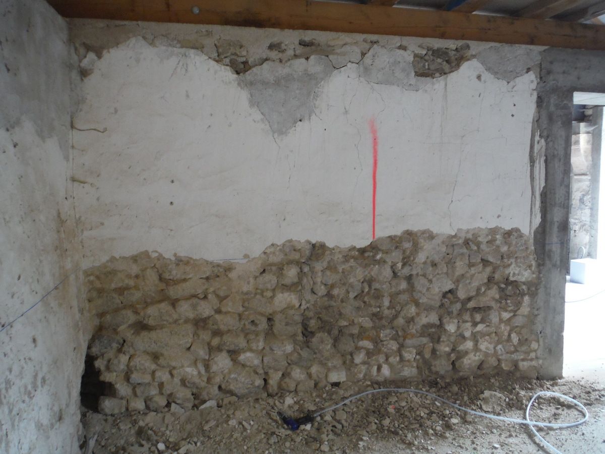 Ponçage de dalle, taille de pierres et piquetage de murs!