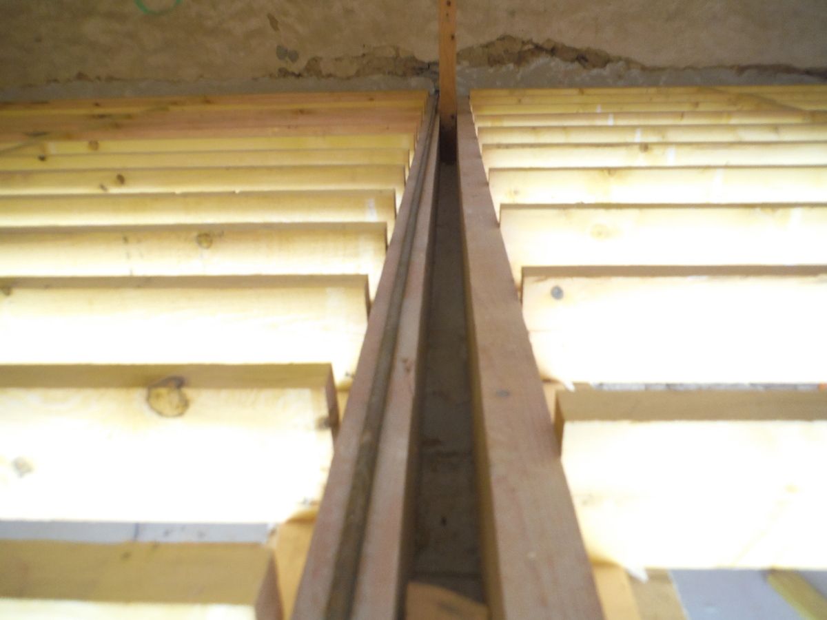 Faire tenir un plancher sur un mur en parpaings!